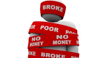 13470962 - a person is wrapped in tape marked with the words broke, poor, and no money, symbolizing being financially strapped an needy due to financial or budget problems, bankruptcy or other cash issue